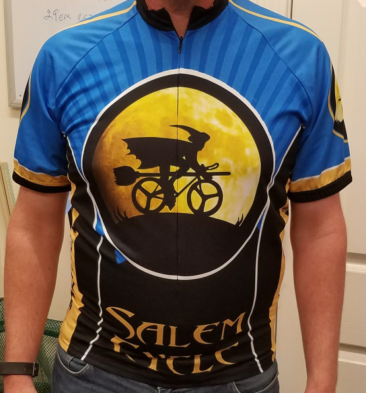 Salem Cycle Witch on Bike Blue Jersey